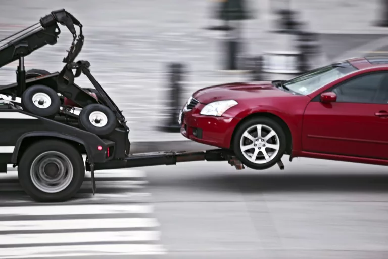 police tow an impound nissan car